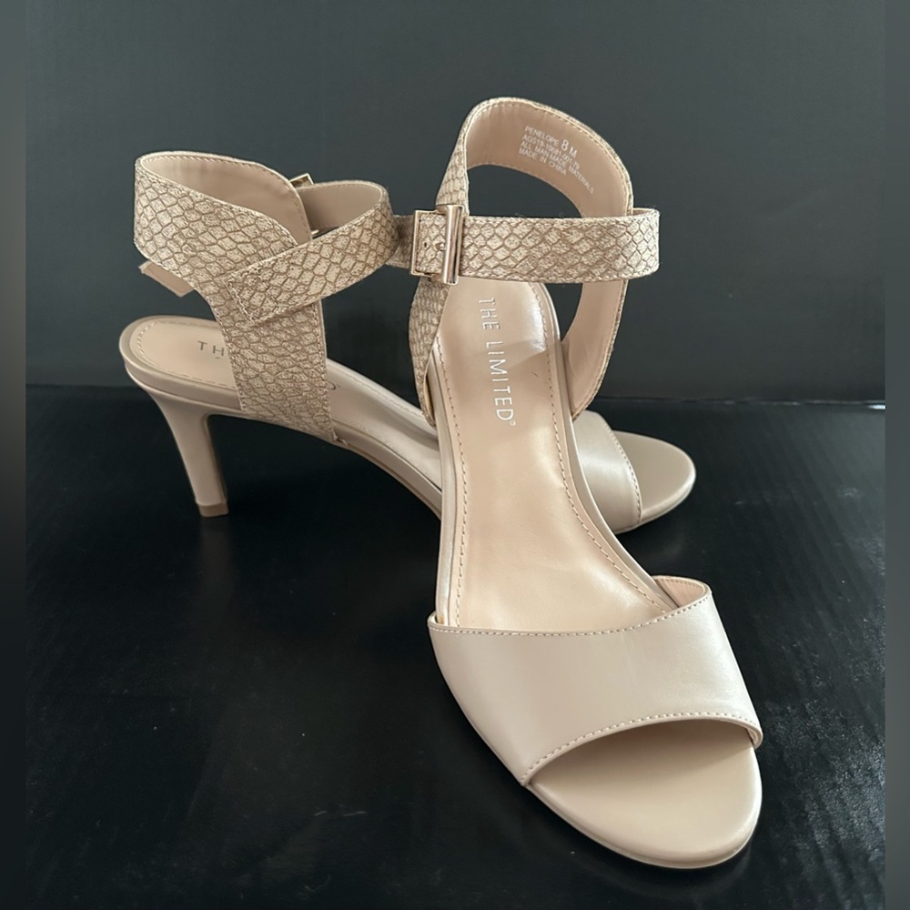 The Limited Beige Open-Toe Heels With a Gold Toned Ankle Strap